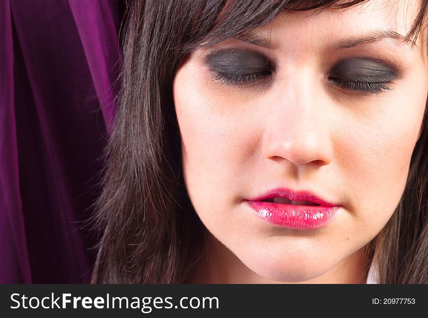 Closeup of a young woman with beautiful makeup