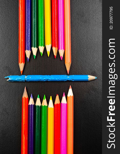 Conceptual photo of some pencils representing a mouth