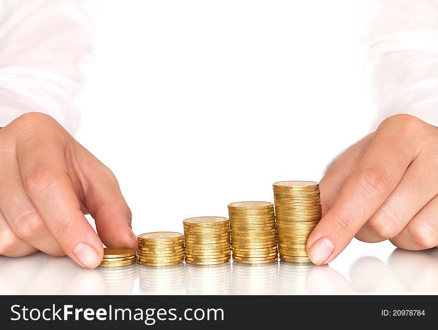 Coins diagram in hands with reflection and empty space for text