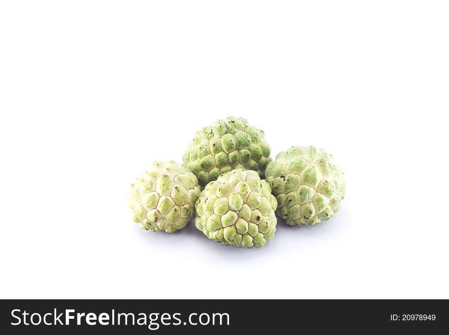 Custard apples group on white background with isolate. Custard apples group on white background with isolate.