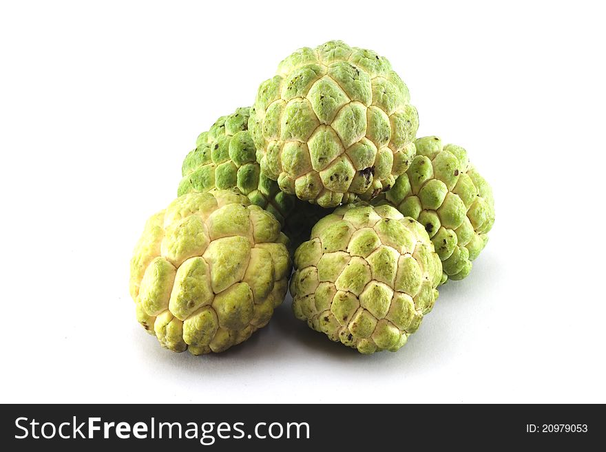 Custard apples group on white background with isolate. Custard apples group on white background with isolate.