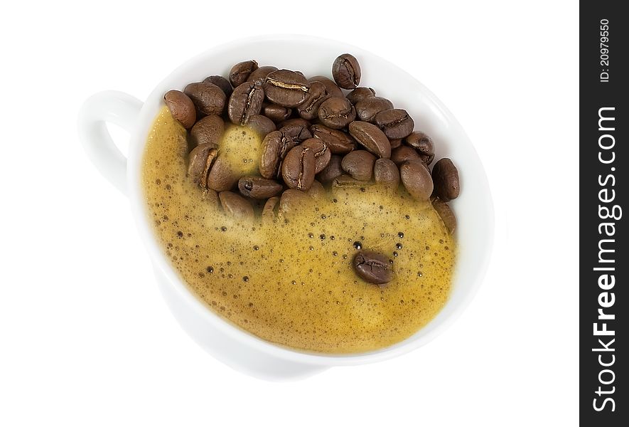 Yin and Yang in a cup of coffee isolated on white background