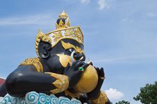 Statue Of Black Deity Called Rahu Stock Photography