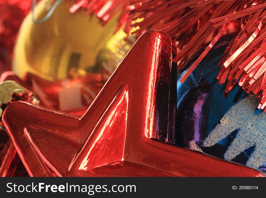 Abstract Christmas image featuring colorful Christmas decorations.