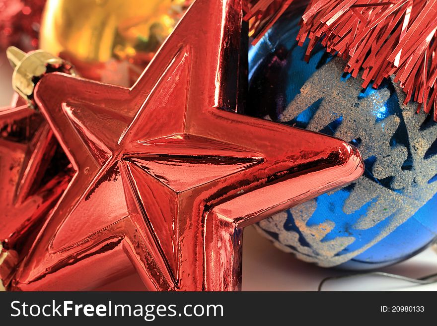 An abstract Christmas image featuring colorful Christmas decorations.