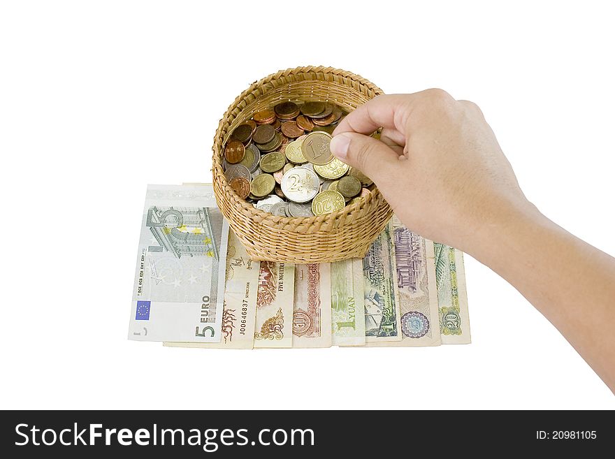 Saving money isolated with coin into a basket on bank notes.