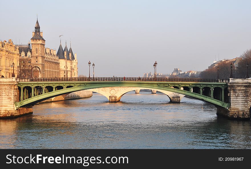 Notre-Dame bridge and the Conciergerie in Paris, France