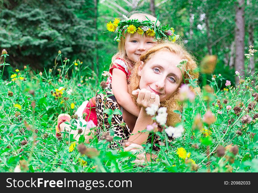 Beautiful Girl With Mother In The Meadow