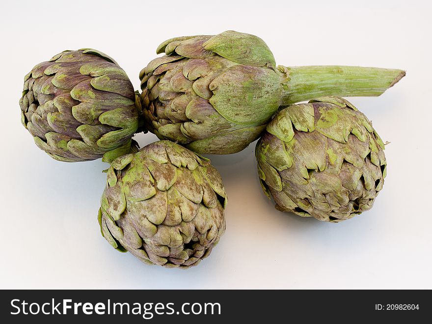 Artichokes four isolated on white background