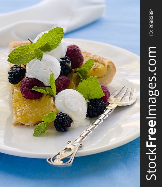 Summer fruit cake with fresh berries and ice-cream. Selective focus