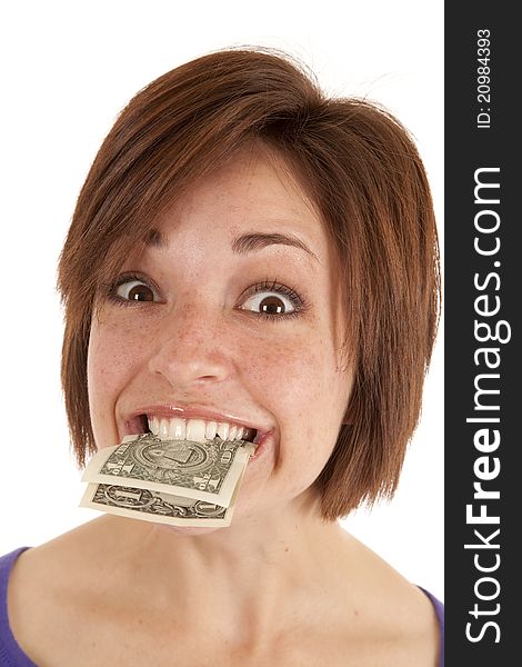 A woman with money sticking out of her mouth. A woman with money sticking out of her mouth.