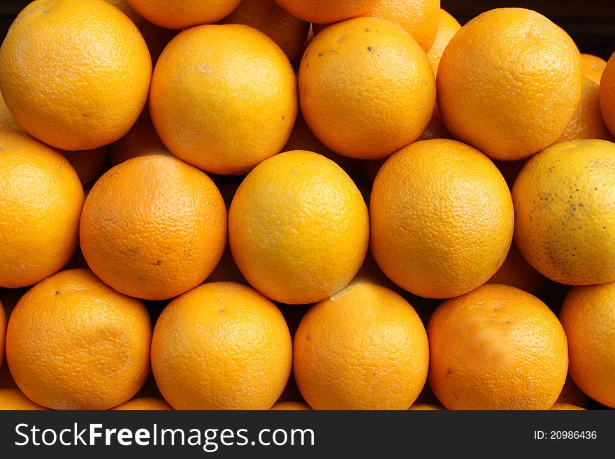 Fresh oranges on display for sale at a shop, India. Fresh oranges on display for sale at a shop, India