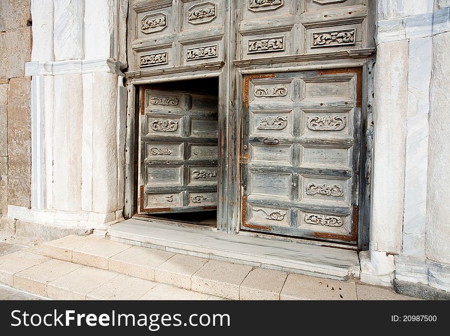 Ancient doors of medieval norman cathedral in Cefalu, Sicily. Ancient doors of medieval norman cathedral in Cefalu, Sicily