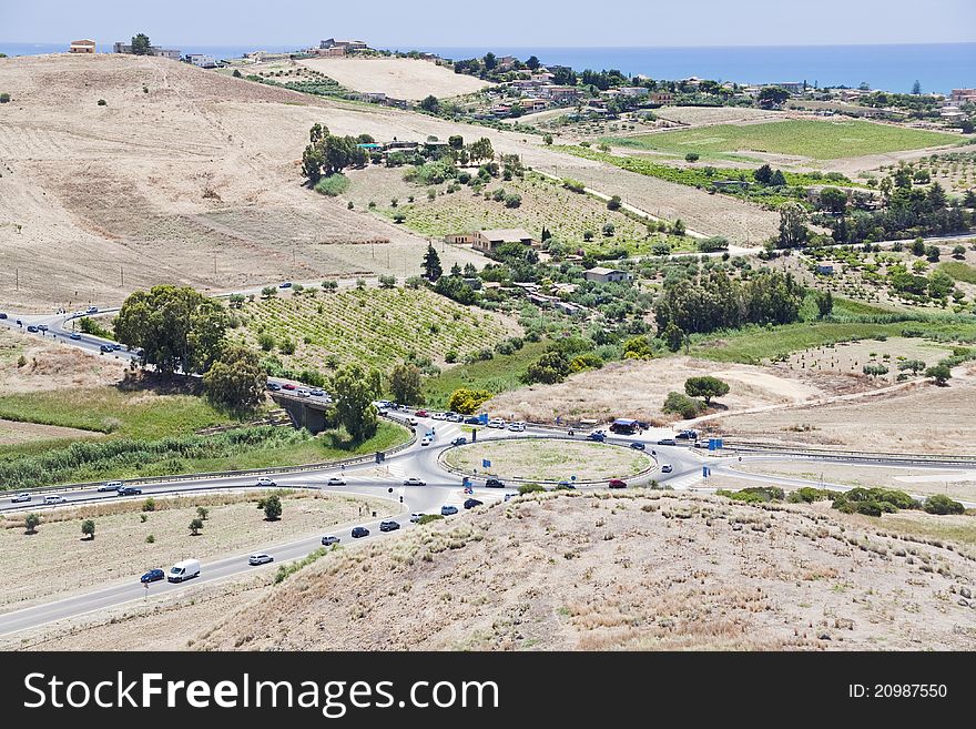 Traffic in countryside on Mediterranean coast near Agrigento, Sicily. Traffic in countryside on Mediterranean coast near Agrigento, Sicily