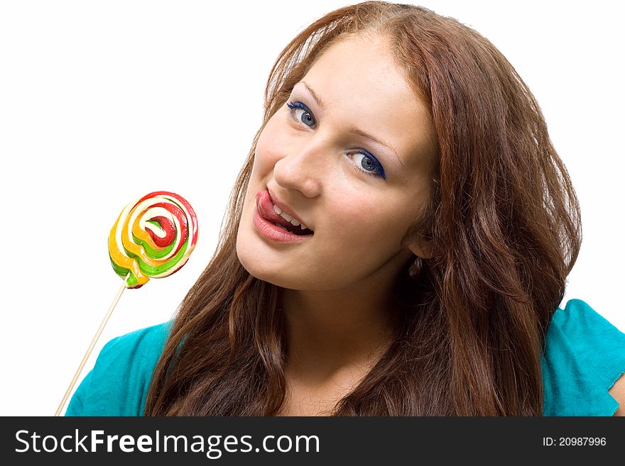 Lovely young woman with lolipop, on white background.