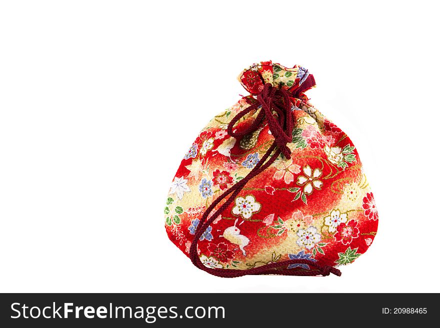 Small red bag for presents isolated on white background