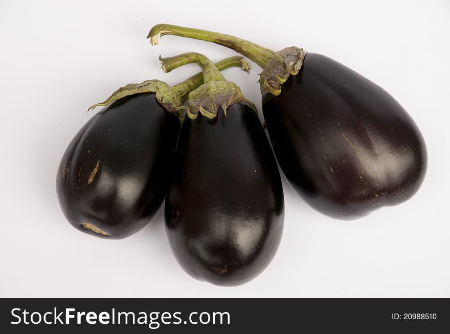 Three Eggplants on white background