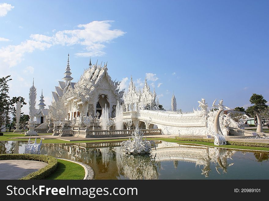 Thai art temple against blue sky