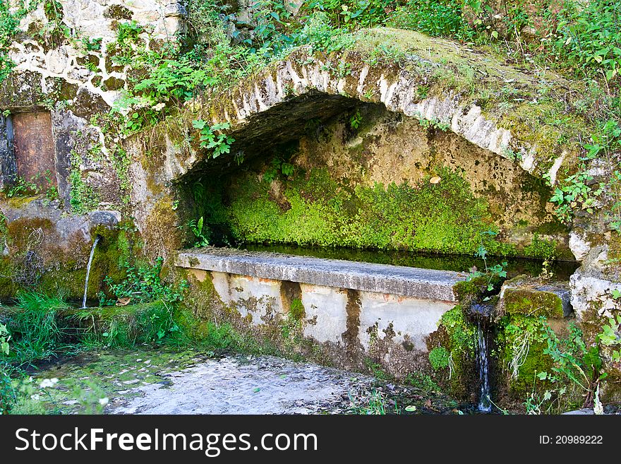 The old fountain near rome