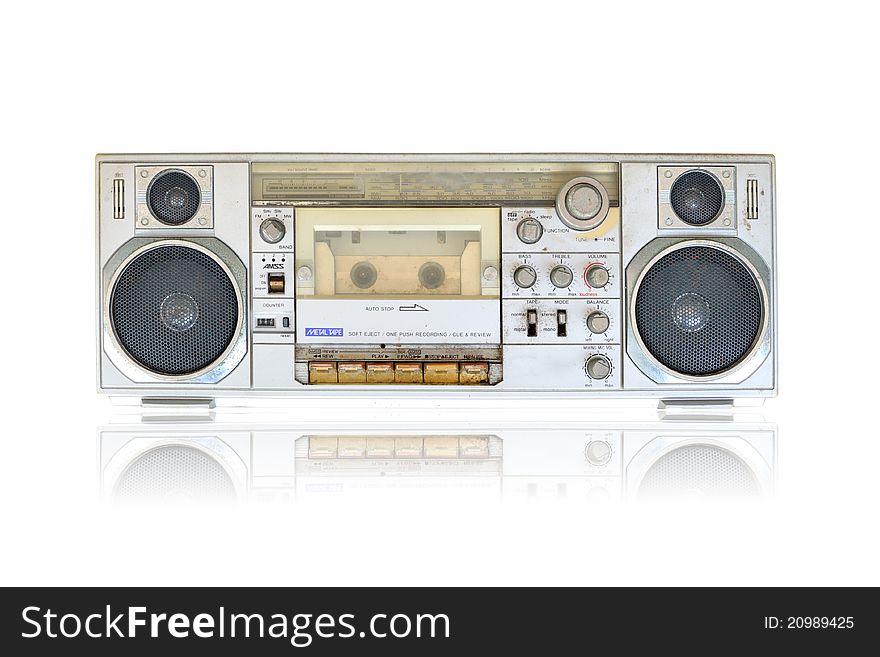 Vintage radio and cassette tape player on white background with clipping path. Vintage radio and cassette tape player on white background with clipping path.