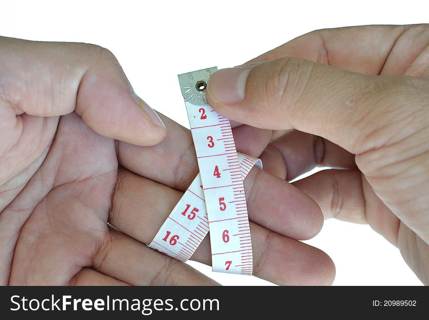 Concept picture of tape measure on human hand. Concept picture of tape measure on human hand.