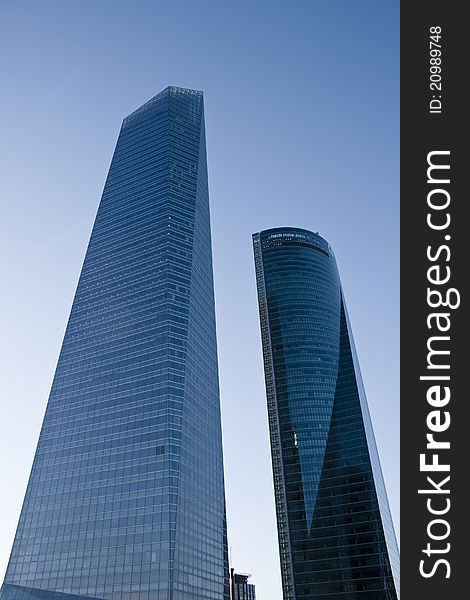 Building skyscrapers at CTBA on Madrid city in Spain with a blue sky. Building skyscrapers at CTBA on Madrid city in Spain with a blue sky