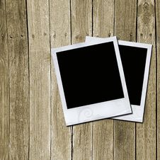 Photo Frames On Wooden Texture Royalty Free Stock Images