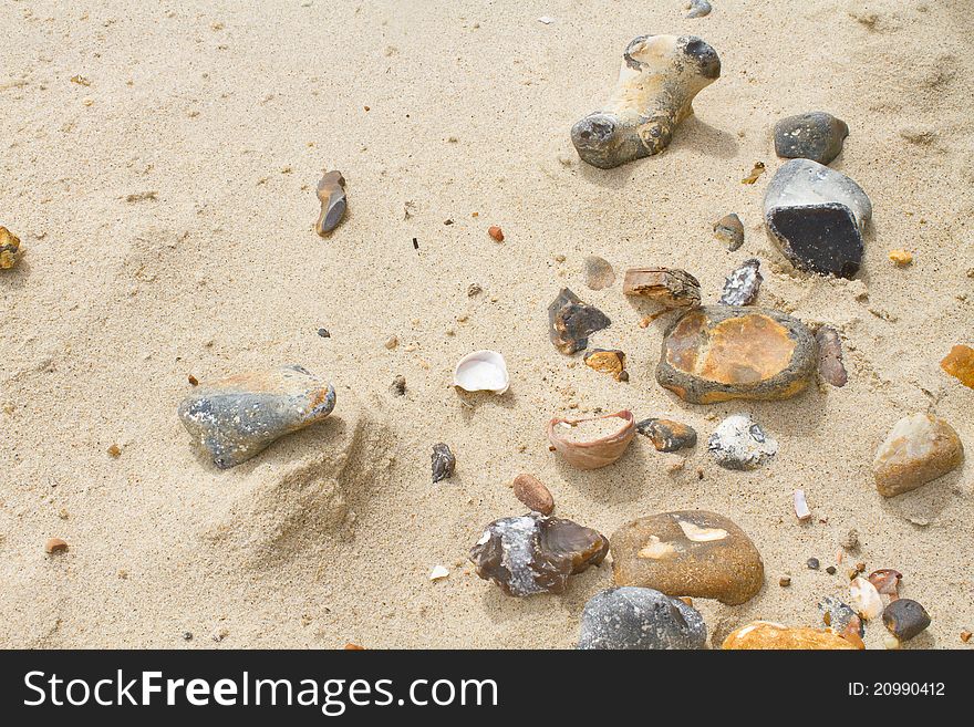 Sand and lots of pebbles on the beach. Sand and lots of pebbles on the beach