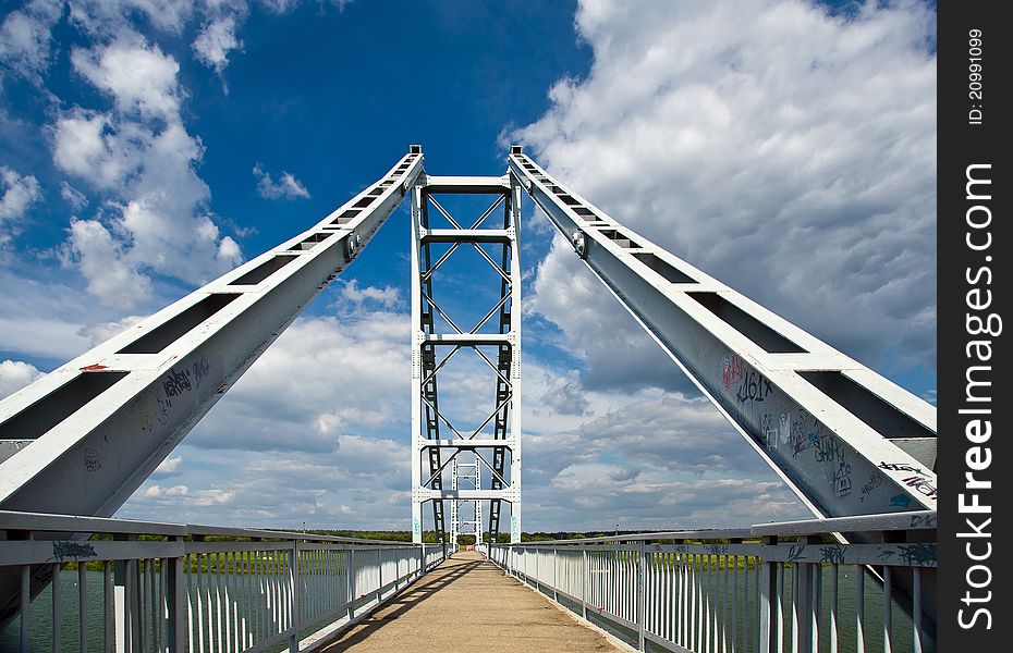 Modern steel bridge over river