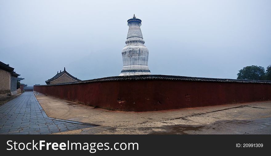 The chinese tower in front of a temple, this tower has already had a history of a thousand years.