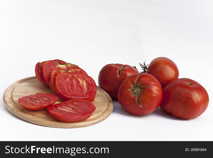 Tomatos on a white background