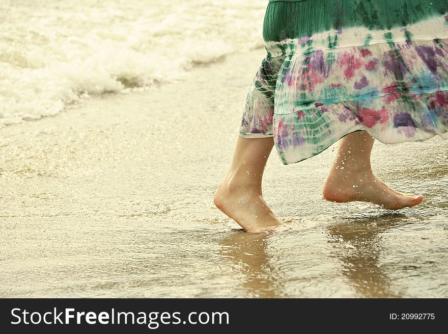 Girl Run On The Beach