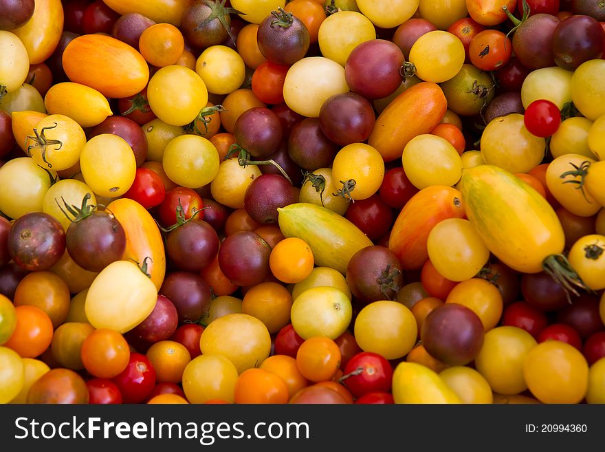 Colorful tomatoes for sale at a farmer's market