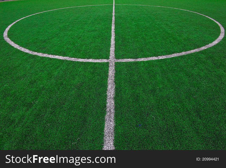 This picture is the green grass soccer field
