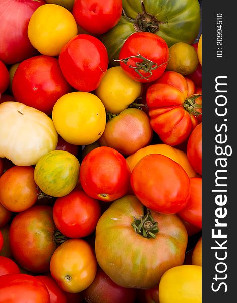 Colorful tomatoes for sale at a farmer's market