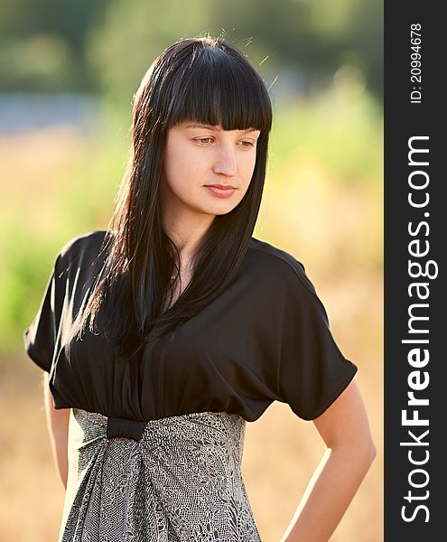 Portrait of a young female in a park. Portrait of a young female in a park