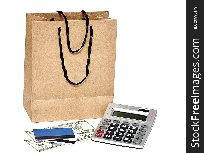 Shopping bag, plastic card, calculator and cash - shopping concept