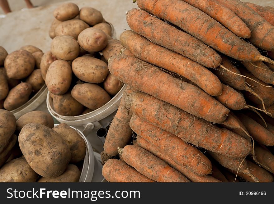 Potato and carrot on local market