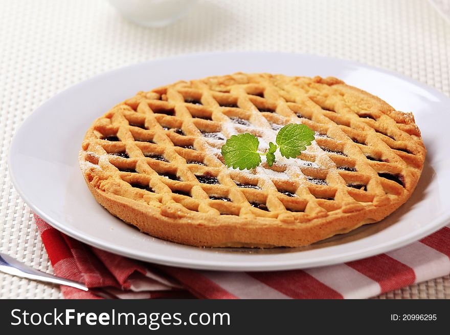 Homemade lattice topped tart with fruit filling