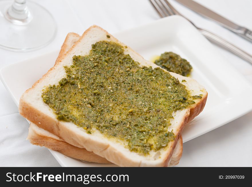 Special Italian toast for breakfast with delicious pesto spread. Special Italian toast for breakfast with delicious pesto spread.