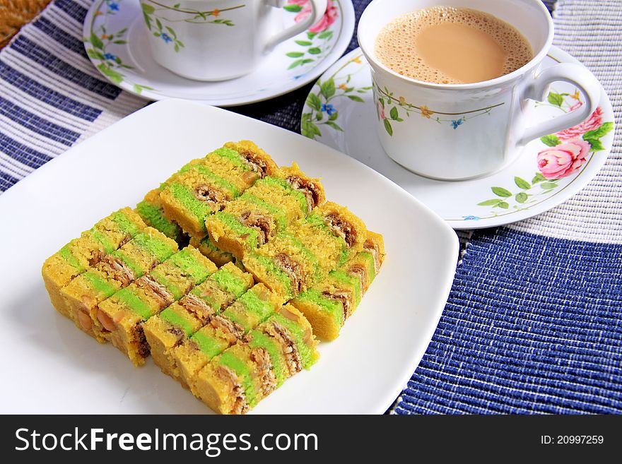 Slices of cake and milk tea, suitable for afternoon tea. Slices of cake and milk tea, suitable for afternoon tea.