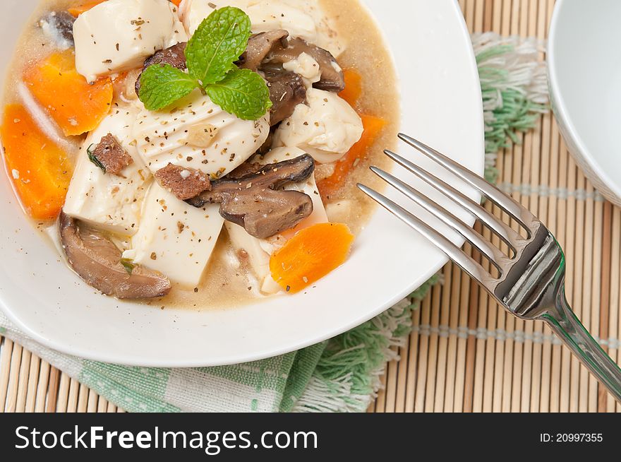 Soft white tofu cut in cubes and topped with delicious miso gravy. Soft white tofu cut in cubes and topped with delicious miso gravy.