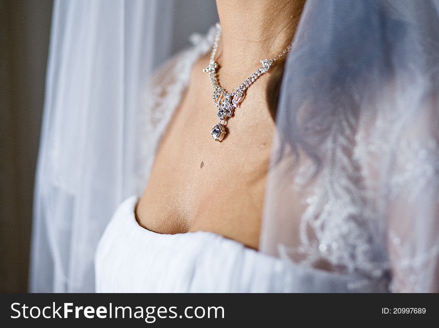 Adornment on neck of young bride