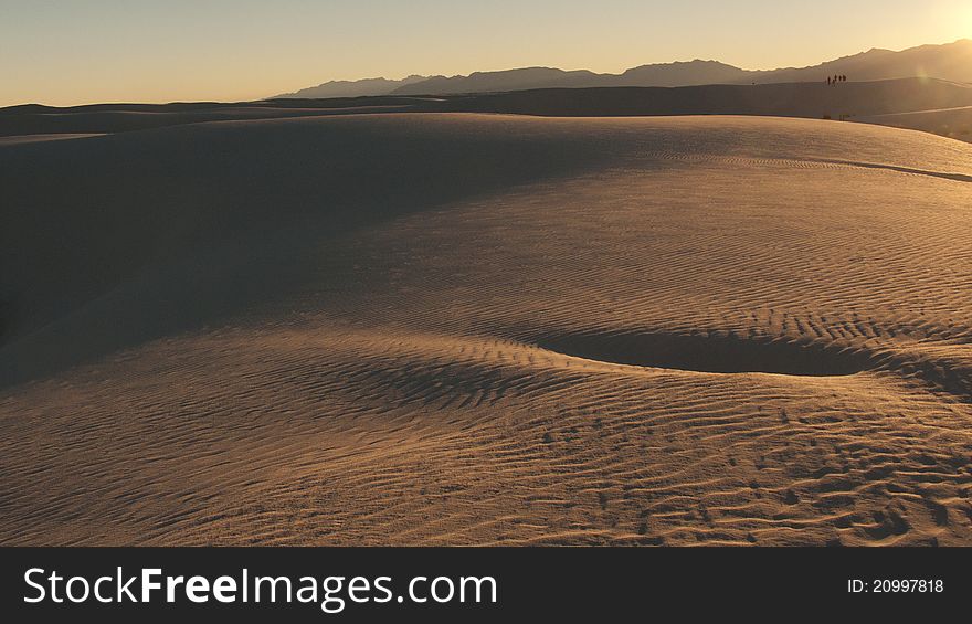 Desert, waves, golden sand and sky. Desert, waves, golden sand and sky.
