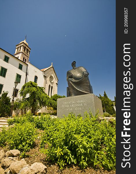 St.Francis monastery and the statue of king Petar Kresimir IV in Sibenik