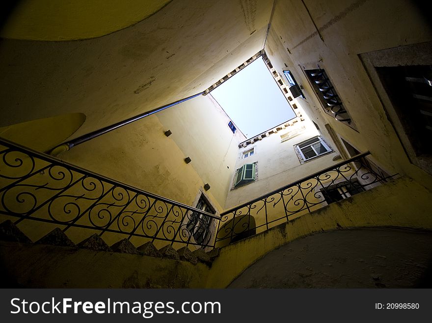 Beautiful building atrium with opened roof in Sibenik. Beautiful building atrium with opened roof in Sibenik