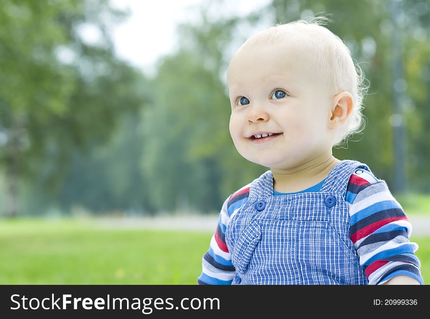 Portrait of little boy in the park