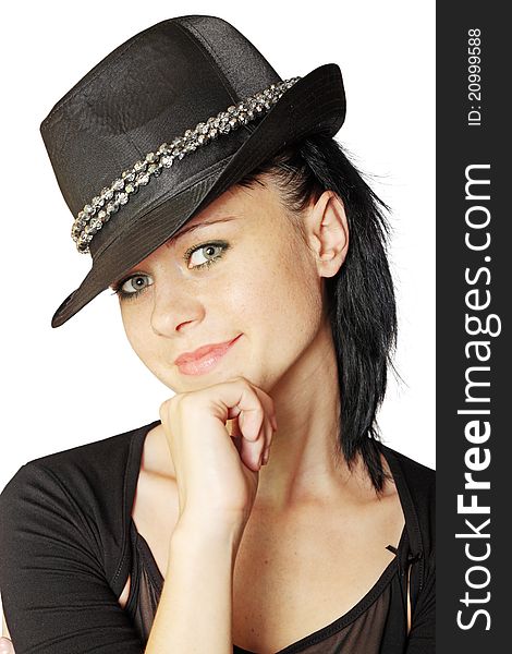 Young beautiful is dark-haired person in the black hat