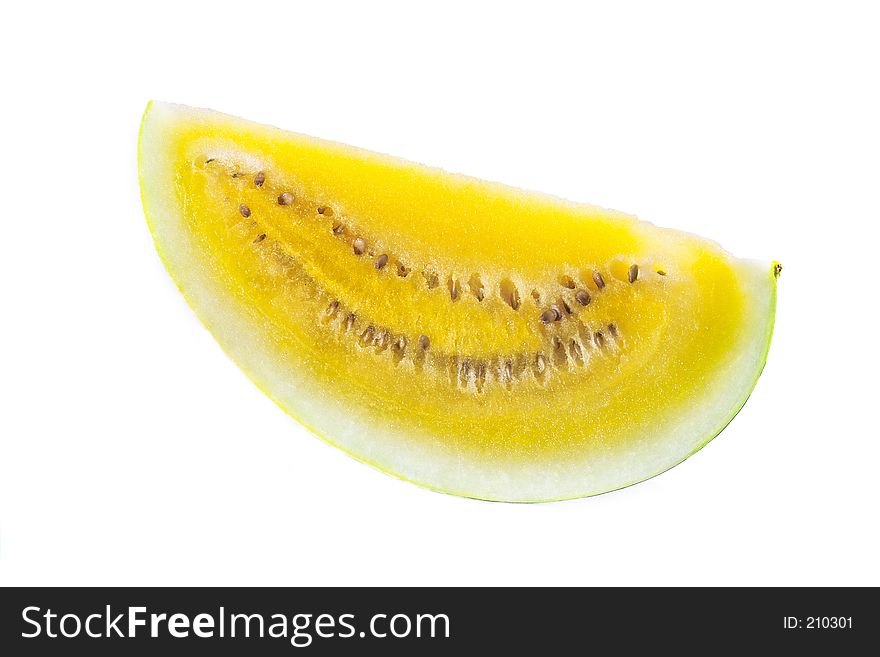 One slice of a yellow watermelon. One slice of a yellow watermelon