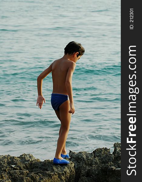 Young boy on sicilian rocks. Young boy on sicilian rocks